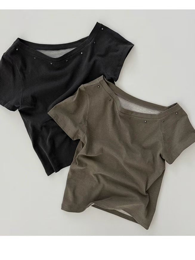 Asymmetric Star-Stud Top