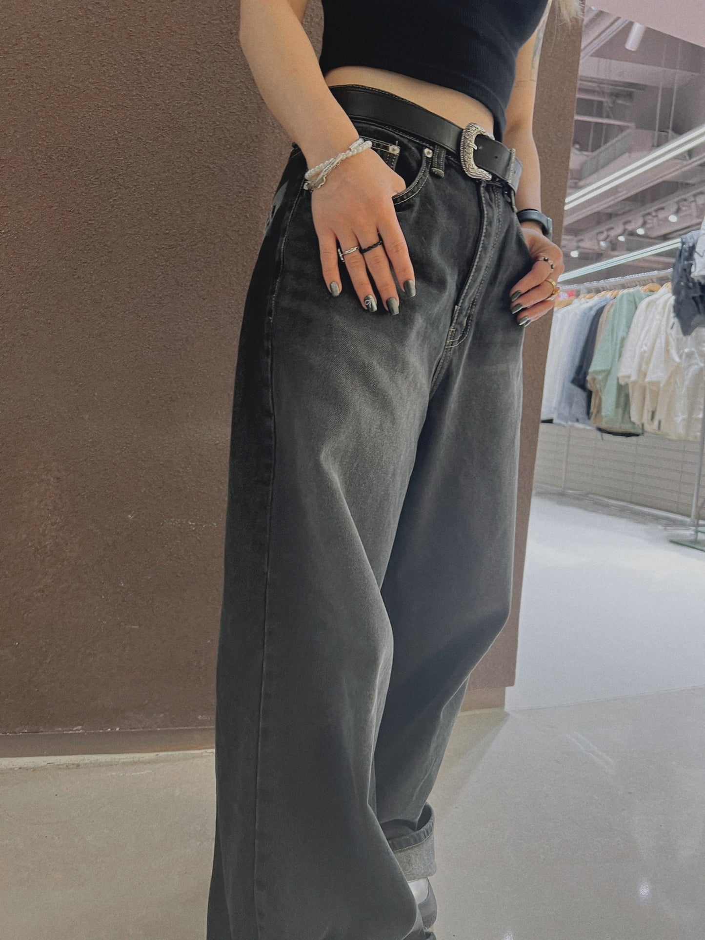 woman bow tie jeans