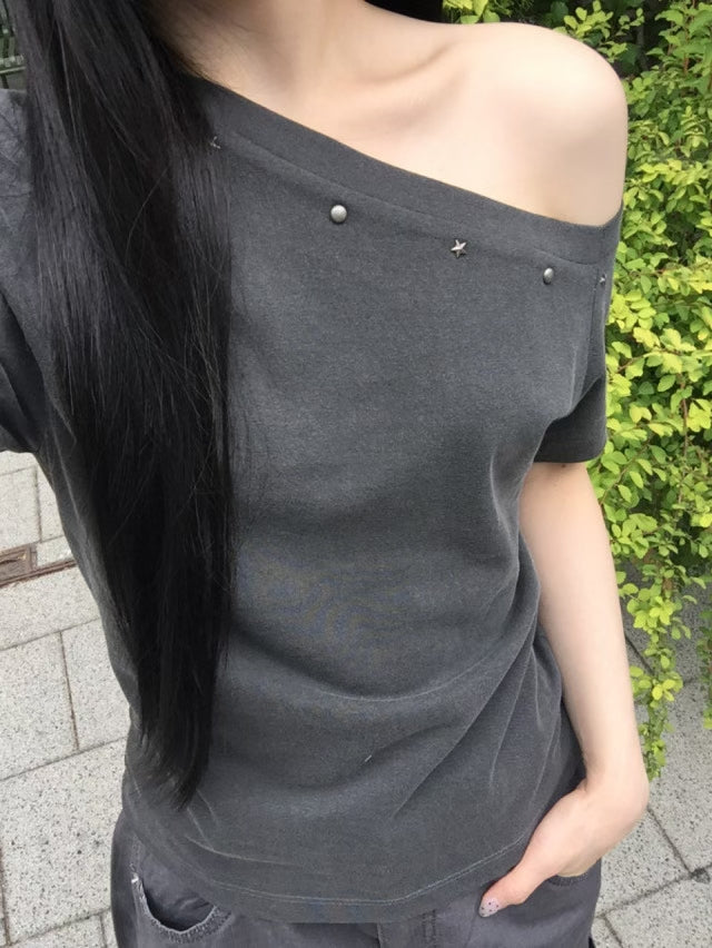 Asymmetric Star-Stud Top