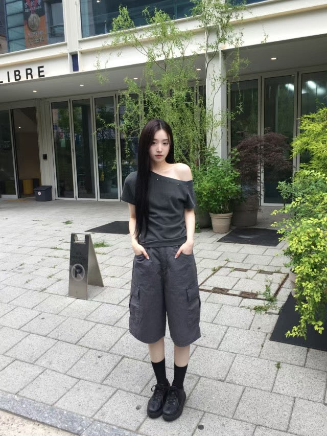 Asymmetric Star-Stud Top