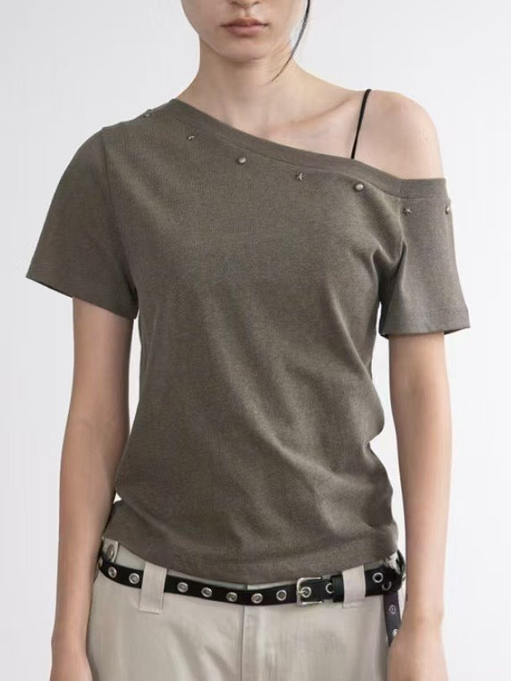 Asymmetric Star-Stud Top