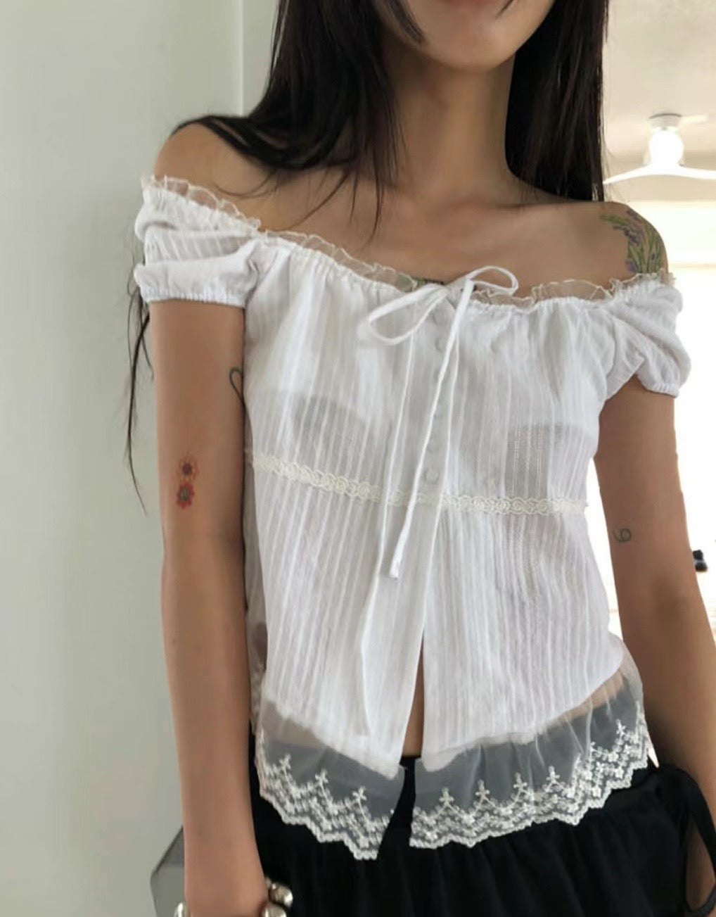 Ruffled off-shoulder shirt