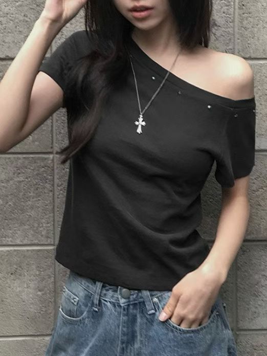 Asymmetric Star-Stud Top