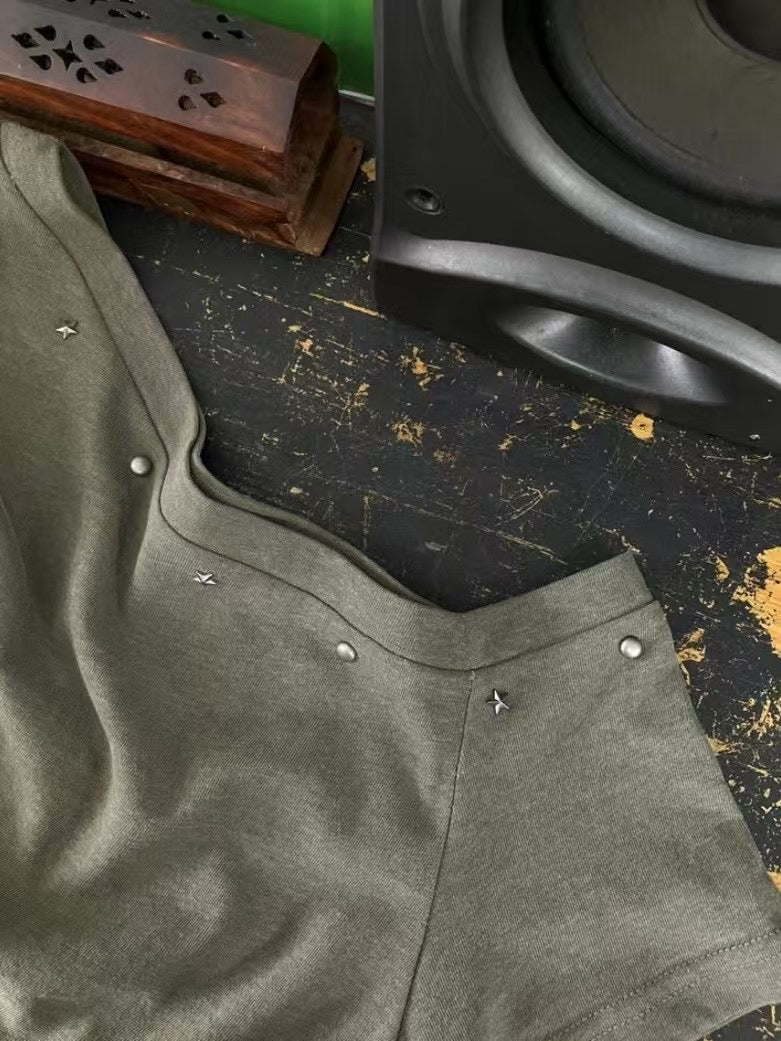 Asymmetric Star-Stud Top