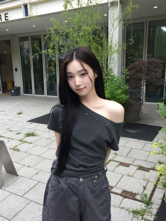 Asymmetric Star-Stud Top