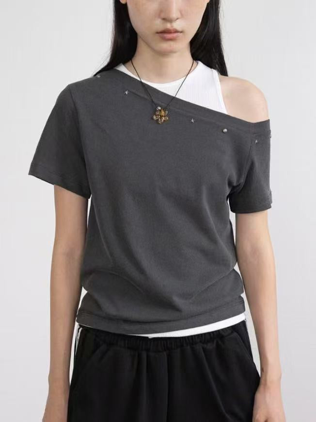 Asymmetric Star-Stud Top