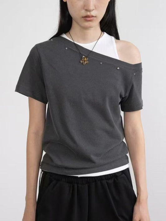 Asymmetric Star-Stud Top